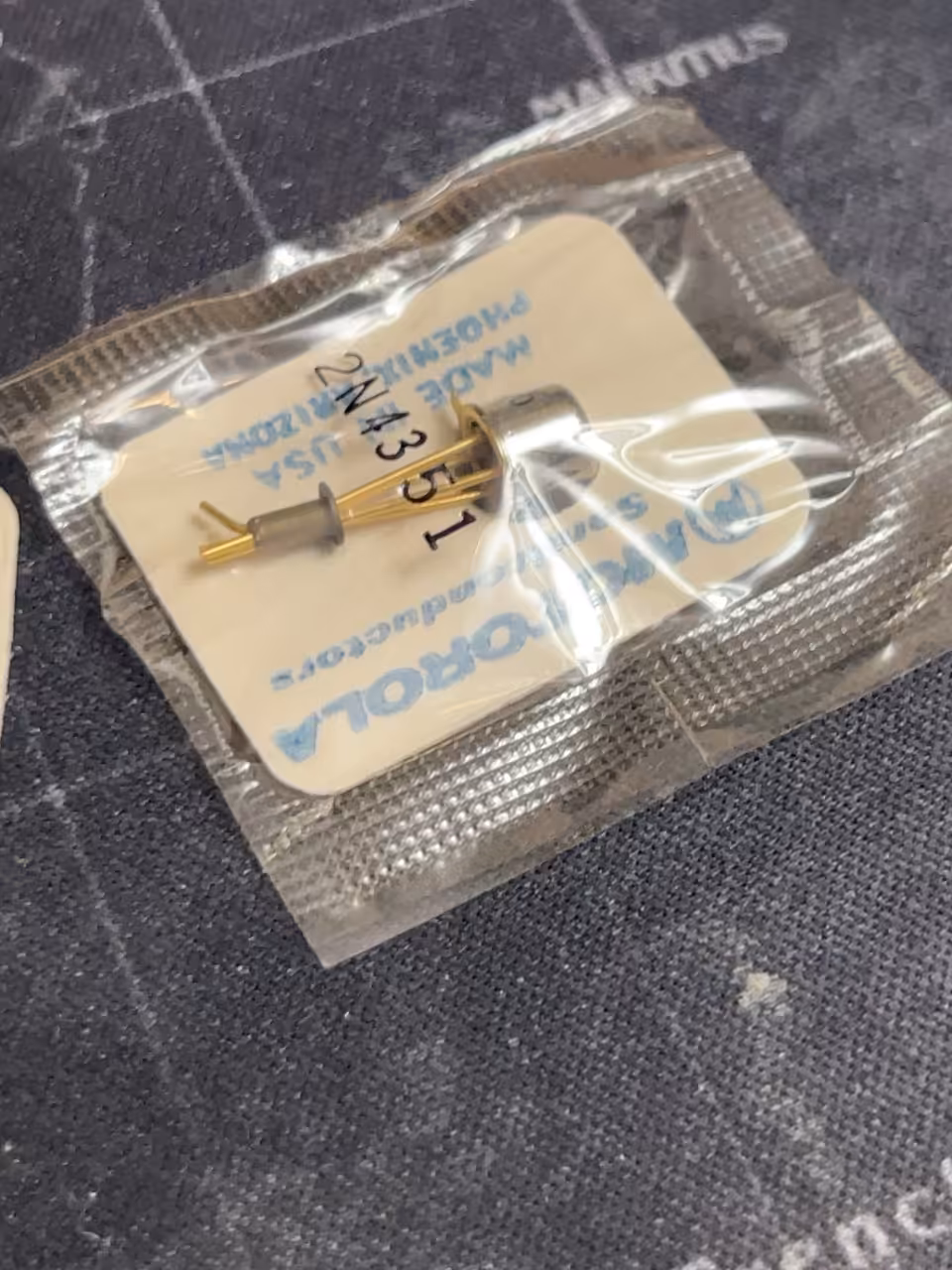 Two Motorola 2N4351 MOSFETs, one sealed in its original Motorola Semiconductor Products packet and one loose